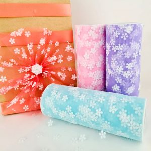 tul estampado con figuras de flores