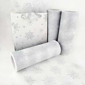 tul estampado con figuras de copos