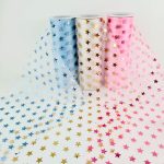 organza estampada con figuras de estrellas metalicas