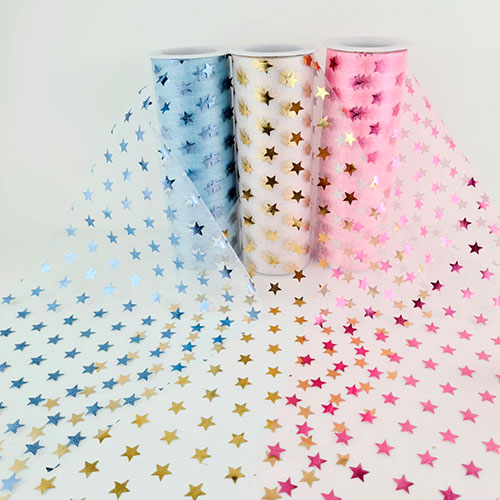 organza estampada con figuras de estrellas metalicas